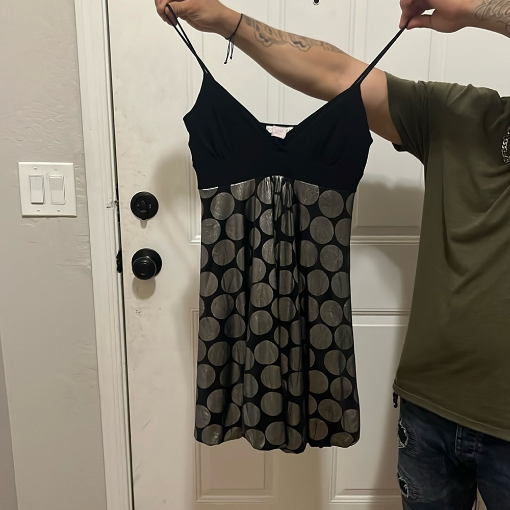 Black spaghetti strap dress with silver dots